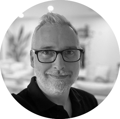 Rob Young, Founder and CEO of RAVENco strategic consulting - professional headshot of experienced business growth expert with 25+ years in digital services and innovation